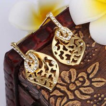 Austrian Crystal earrings yellow hollow stud earrings orecchini love 141 ELY
